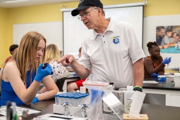 professor teaching biology summer camp